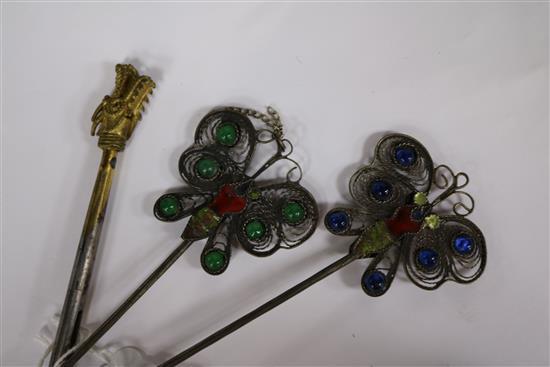 Three metal, glass and enamel hair ornaments